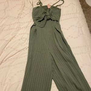 Green and white striped flare leg jumpsuit